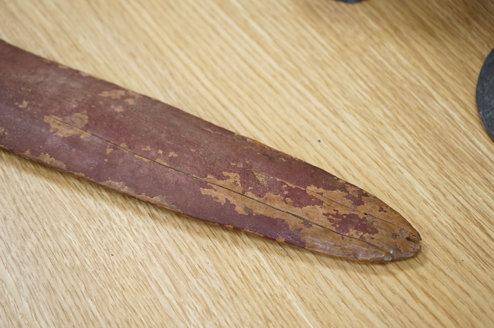 An Australian aboriginal boomerang, 56cm wide, collected in Australia c.1945